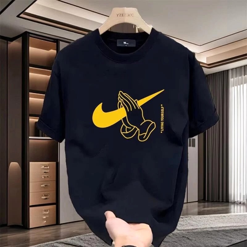 Nike Black Graphic Tee Review: Sweat-Dry Time and Print Checks on the $4.18 Cotton Crew in a 93°F Workshop